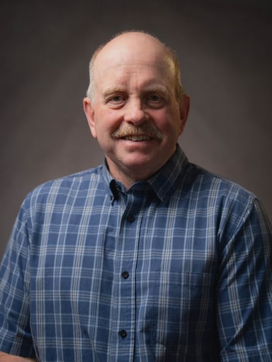 A portrait of Tim Rice