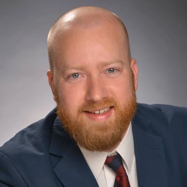 A portrait of Toby J. Sumpter
